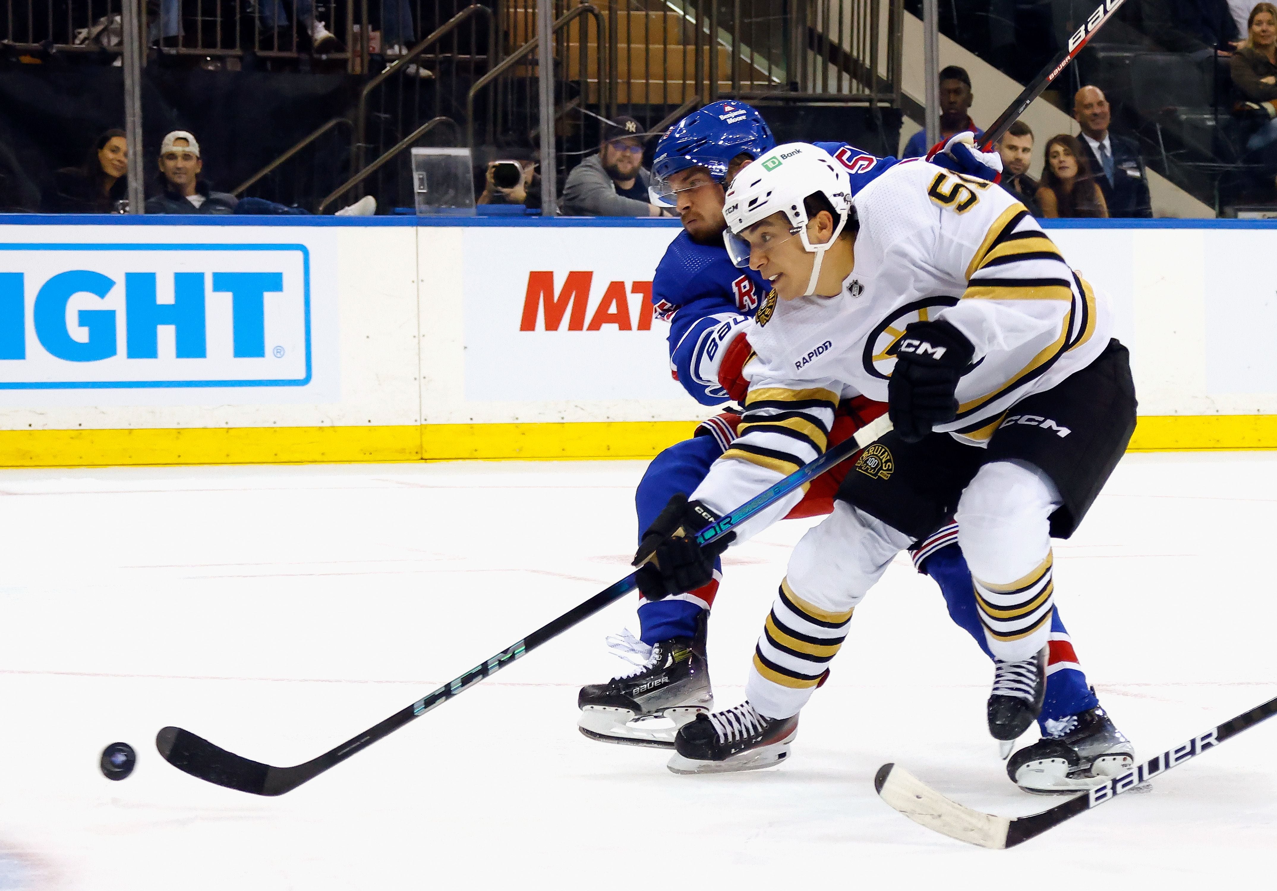Bruins rookie Poitras plays his way onto roster