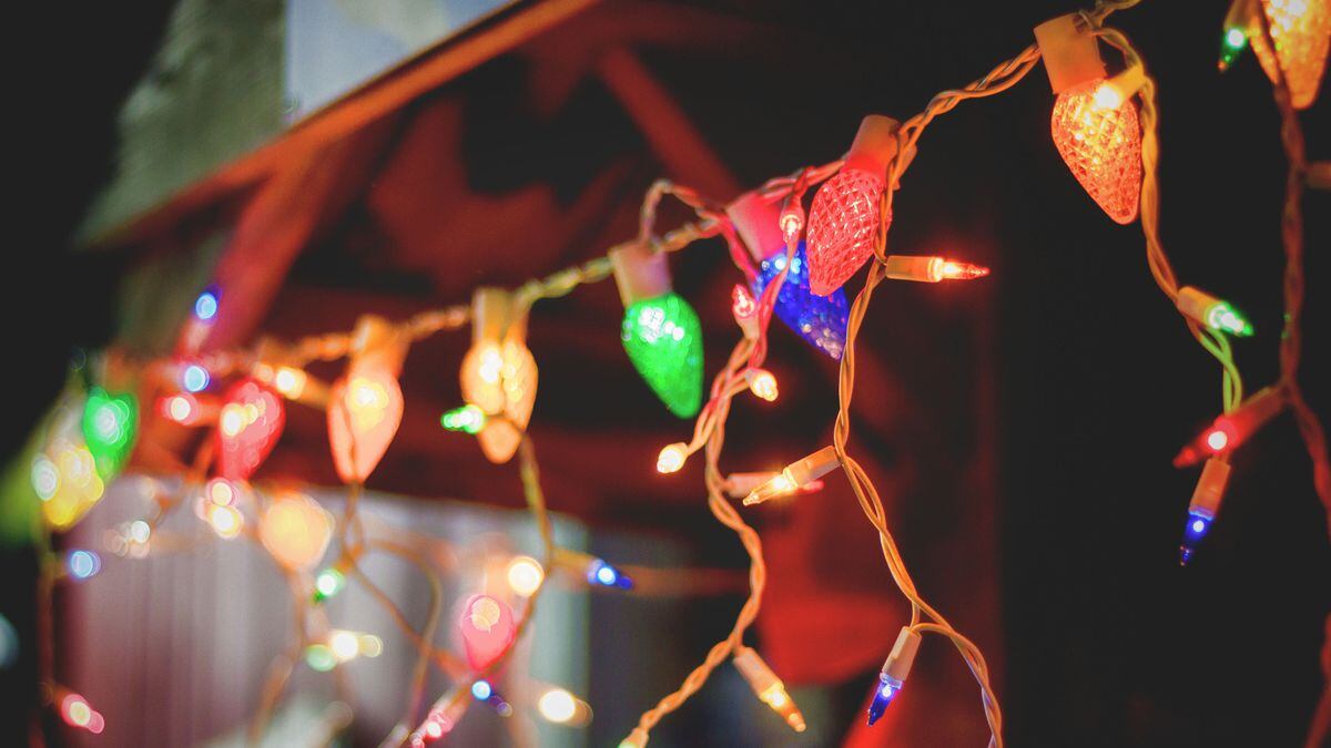 Coronavirus People string up Christmas lights to brighten dark times